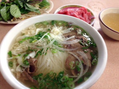 Southern style beef pho with rare beef own the side.